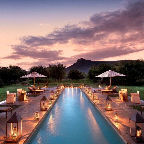 Pool area at Samara Manor in the Karoo, with views of the surrounding landscape