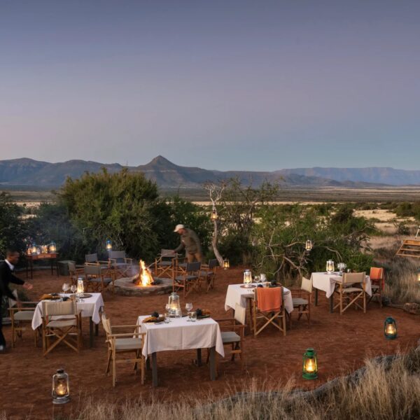 Boma area at Samara Plains Camp in the Karoo, with seating around a fire pit and views of the surrounding plains